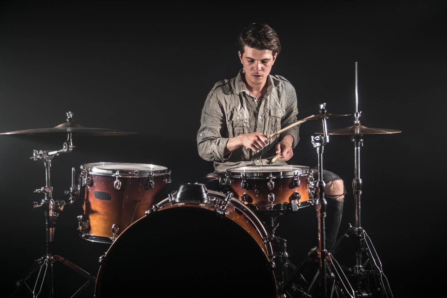 How Do Room Reverb and Panning Make Drums More Realistic?